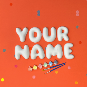 White paint-your-own bubble name letters on an orange background – Jubiloo